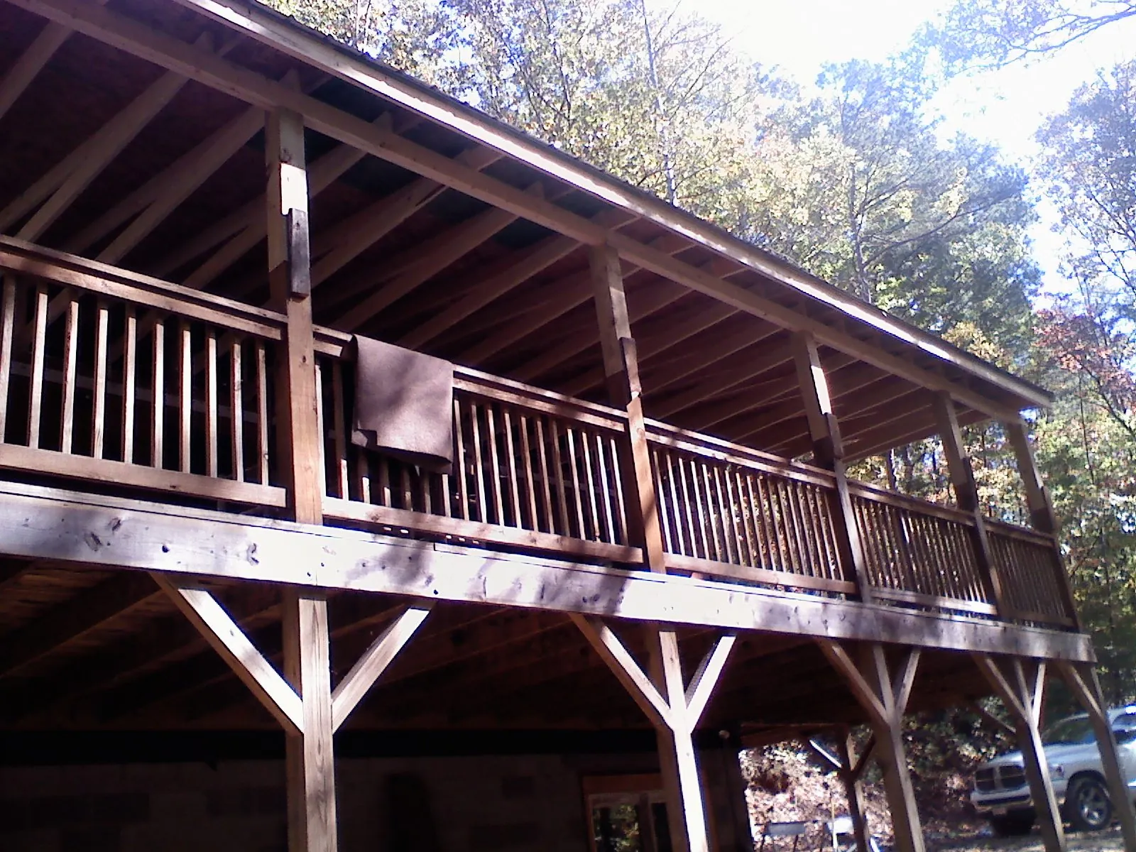 Timber framing under a new elevated porch and deck — Roof Leak Repair in Carman by Roofing Brothers